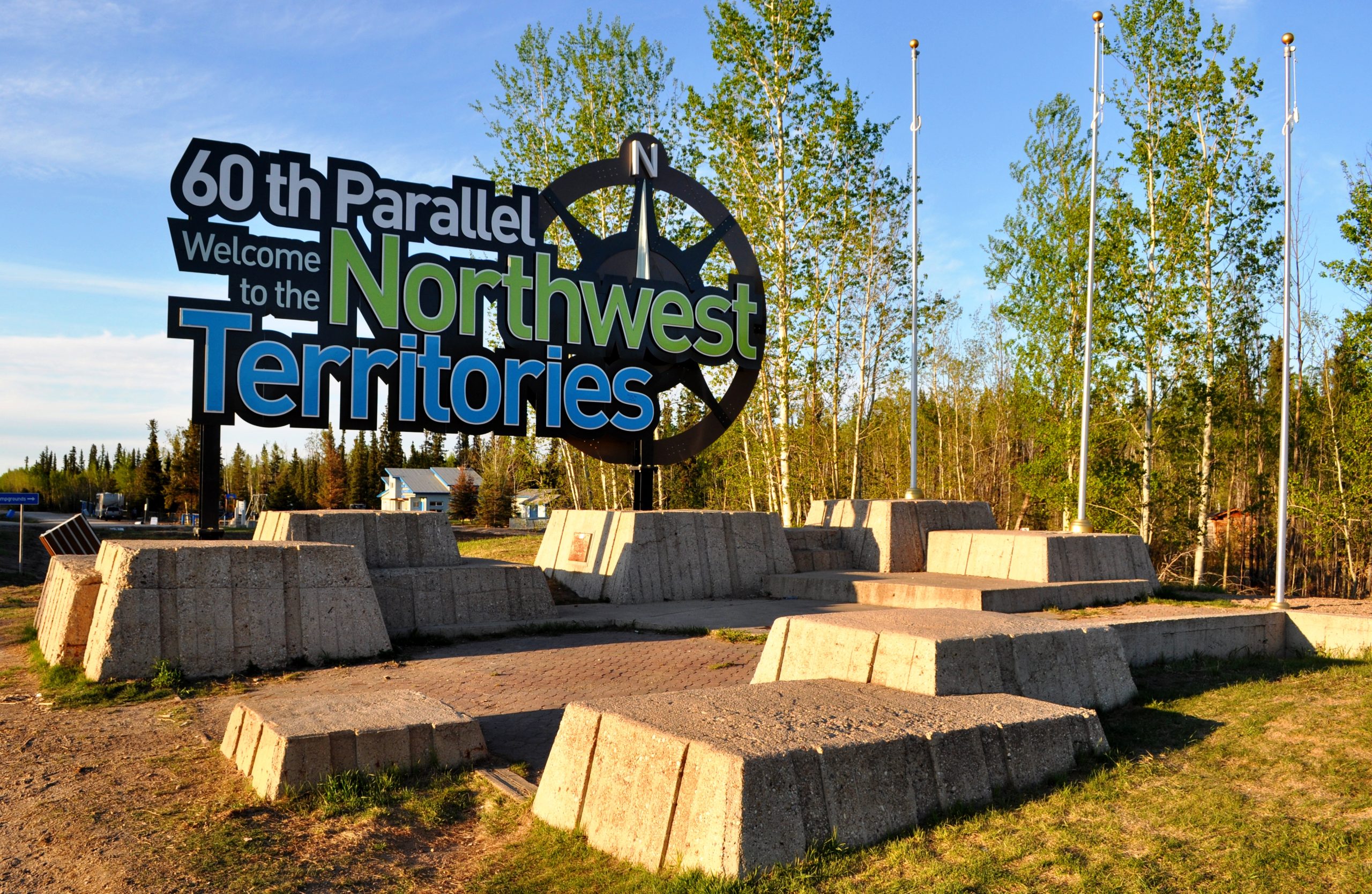 Sign welcoming people to Northwest Territories at border with Alberta