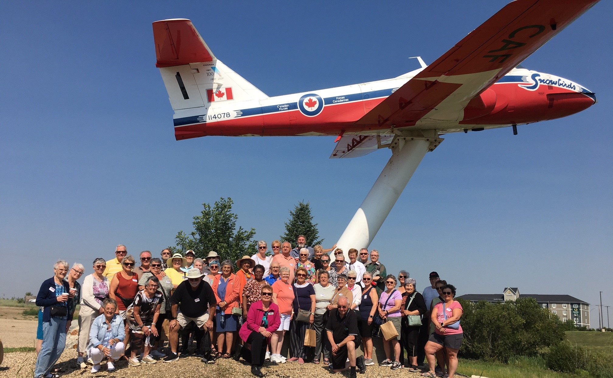 2025 Group photo with Snow Bird Jet in Moose Jaw